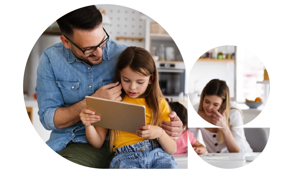 Fotografia di padre e figlia che guardano insieme lo schermo di un tablet